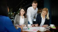 Zarządzanie i inwestowanie w nieruchomości | Studia podyplomowe w Bydgoszczy | Uniwersytet WSB Merito Bydgoszcz: Główna grafika: Toruń - studia podyplomowe - Uczestnicy studiów podyplomowych podczas zajęć
