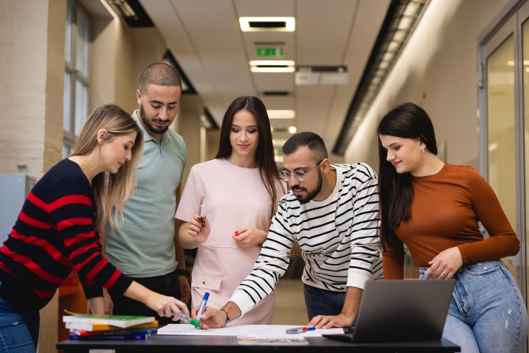 How to legalise your stay in Poland? | WSB Merito University in Chorzów: A group of students working on a project