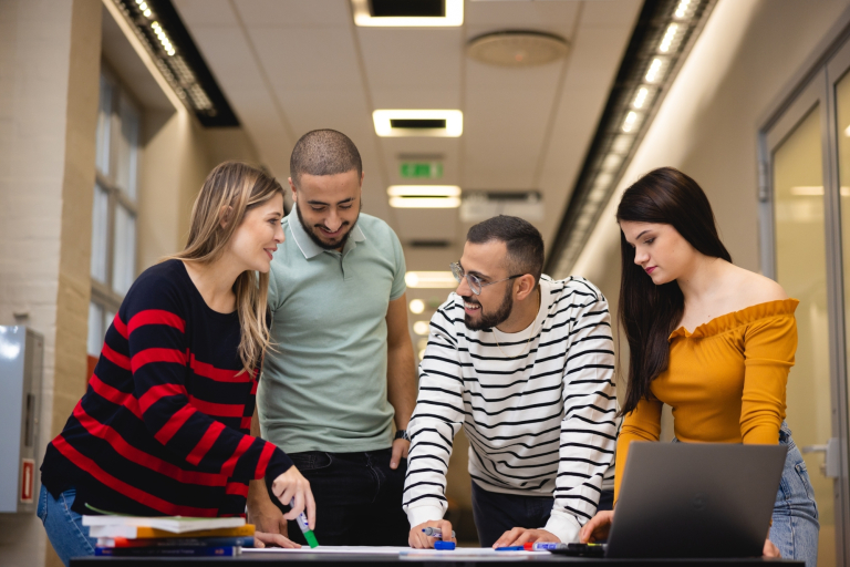 Admissions process stages | WSB Merito Poznań University: A group of students working on a project